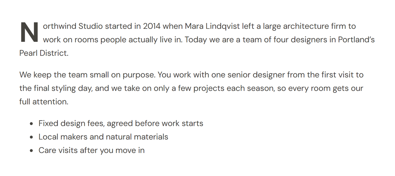 Two paragraphs about the studio starting with a large drop cap N, followed by a bulleted list of three items